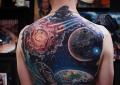 Tatuajes de astronautas para hombres en el brazo.